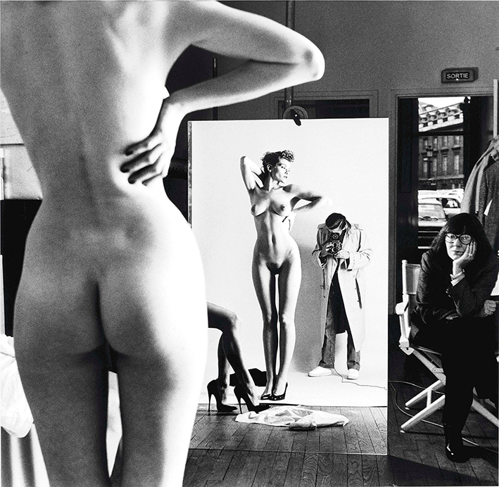 Self-portrait with wife and model © Helmut Newton